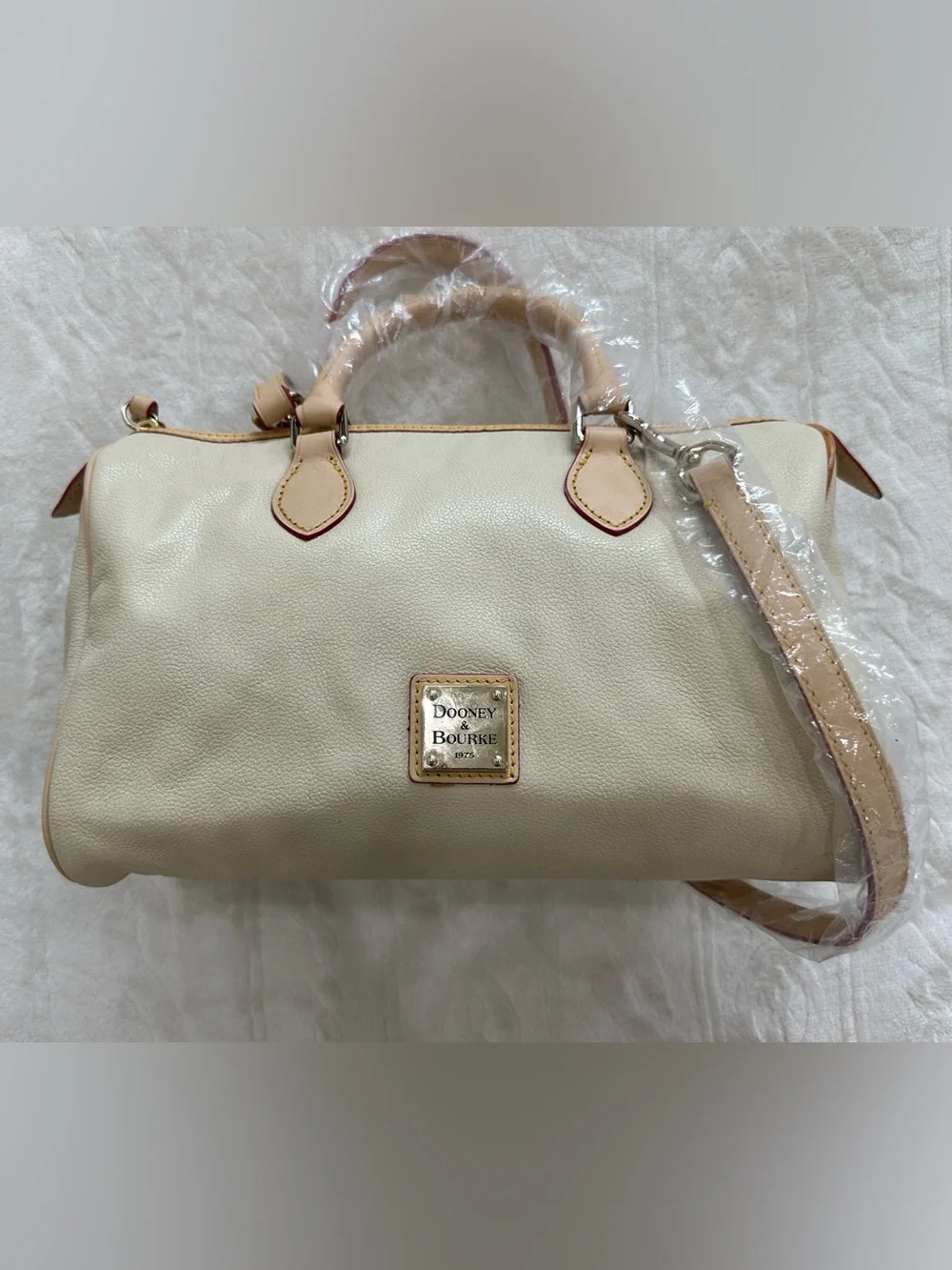 Dooney & Bourke Cream Leather Satchel with Tan Trim and Navy Tag Accent